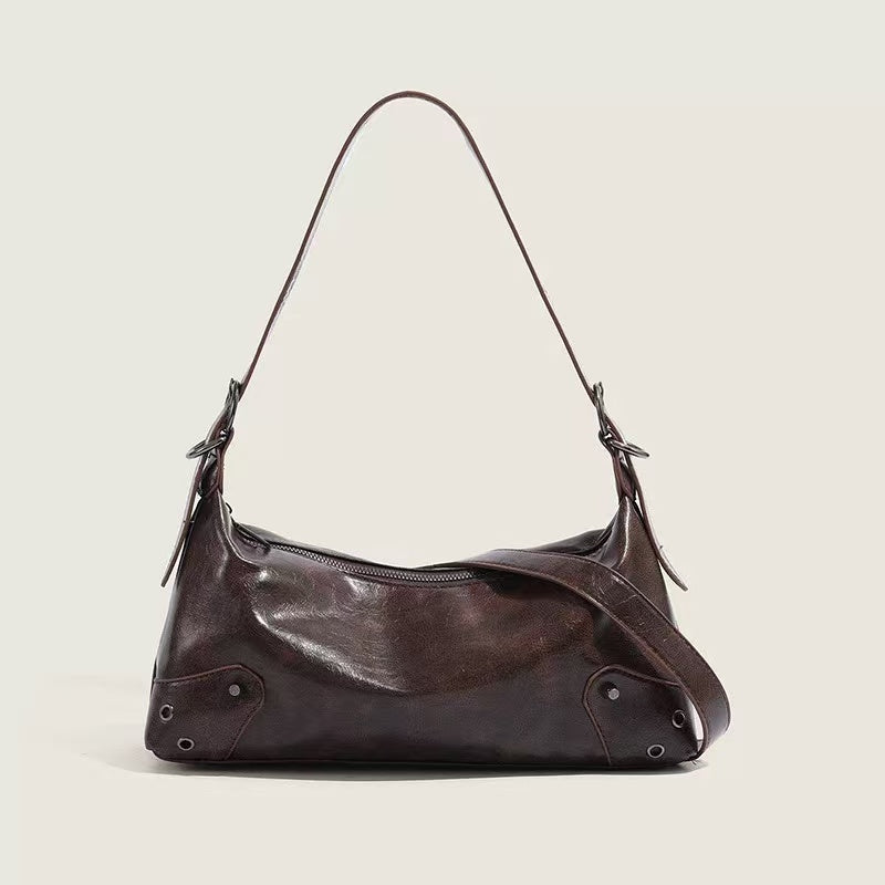 Amoirelle Marlow brown moto shoulder bag with buckle strap, front view