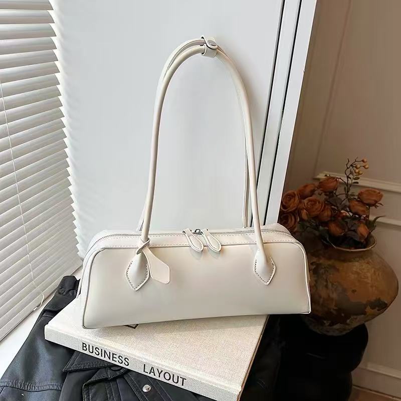 Amoirelle Solenne ivory calf leather shoulder bag, front view